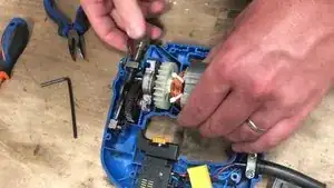 Lift the assembly to release the engine.