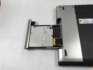 Disk Drive Tray Latch Mechanism