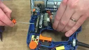 Lift the stator, then lever out the motor.