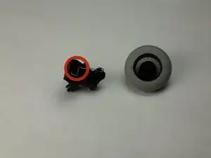 Disassembling Logitech MBJ58 Mouse Scroll wheel from mount