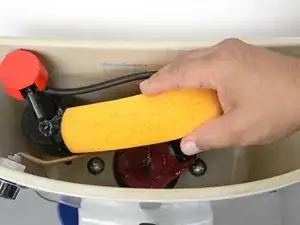 Sponge Drying a Toilet Tank