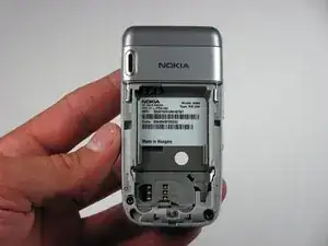 Disassembling Nokia 6086 Upper Back Cover