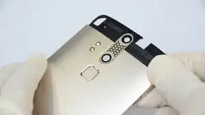 Remove the fingerprint sensor and flash sub-board.