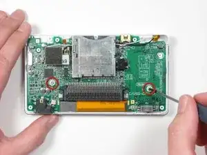 Removing Nintendo DS Lite Logic Board losschrauben