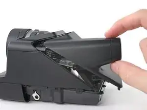 Ausbau der Rückabdeckung mit Filmklappe