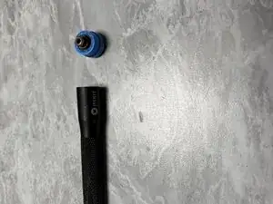 Wie die Kappe wieder eingebaut wird