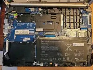 Disassembling HP 14-ck0061st View of bottom cover removed