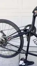 Test the bike to ensure the stand no longer obstructs pedaling.