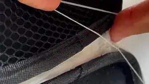 Make a knot to secure the stitches. The knot should be as close to the exit point as possible.