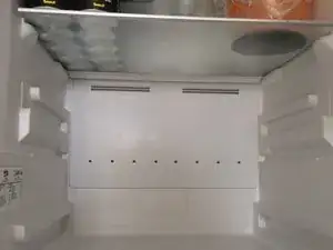 Beko refrigerator leaking water inside, under the vegetable drawer.
