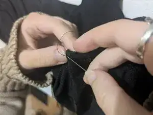 How to Repair Ripped Seams on a Liquid Knit Garment by Hand