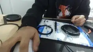 Simple press Lightly on the back of the driver and lift the driver out. just be mindful of the headphone jack when taking it out