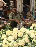Ein Blumenkohlhändler in Indien