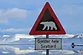 Auf der norwegischen Insel Spitzbergen warnt dieses Schild die Autofahrer vor Eisbären.