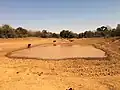 Was von einem See in Burkina Faso während der Trockenzeit übrigblieb