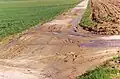 Erosion bei einem Weg an einem Feld