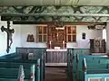 In der Kirche Sankt Margarethen auf Gröde. Sie hat dort eine eigene Warft.