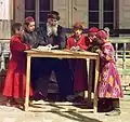 Jüdische Kinder mit ihrem Lehrer. Das Foto wurde vor über 100 Jahren in Samarkand gemacht, einer Stadt in Russland.