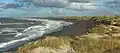 Wellen an einem Strand von Dänemark