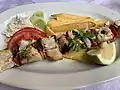 Ein Fischgericht in einem Restaurant