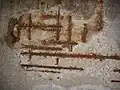 Der Armierungsstahl an dieser Betonoberfläche ist verrostet.