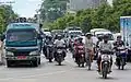 Straßenverkehr in der Stadt Mandalay, im asiatischen Land Myanmar