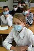 Mundschutz gegen die Ansteckung mit Grippe...