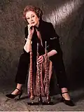 Eine Oboistin mit ihren drei verschiedenen Instrumenten
