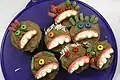 Cupcakes, die wie Monster aussehen