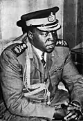 Der Diktator Idi Amin von Uganda. Nachdem man ihn davongejagt hatte, ging er ins Exil nach Libyen.