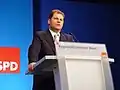 Auf einem Parteitreffen der SPD im Jahr 2003 hat Olaf Scholz noch eine andere Frisur.