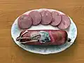 „Krakauer“ ist der Name einer Wurstspezialität.