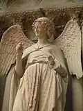 Hochgotik: Der lächelnde Engel vom Westportal der Kathedrale in Reims, 1240