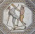 Zwei Gladiatoren auf einem alten Mosaik. Man hat es in einer römischen Villa gefunden. Das Bild ist etwa 2000 Jahre alt.