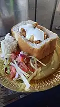Bunny Chow ist ein beliebtes Fastfood. Es stammt von den Einwanderern aus Indien.