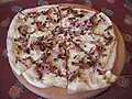 Der Flammenkuchen ist das bekannteste Gericht des Elsass