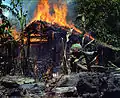Im Vietnamkrieg: Die amerikanische Armee zerstört dieses Lager der Kommunisten.