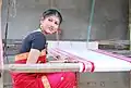 An einem Webstuhl in Assam, Indien