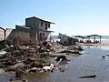 Schäden nach einer Sturmflut in El Salvador