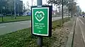 Poster in den Niederlanden im Jahr 2020: Es bittet die Leute in der Corona-Pandemie, Abstand zu halten.