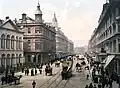 Eine belebte Straße in der amerikanischen Stadt Detroit, um das Jahr 1900