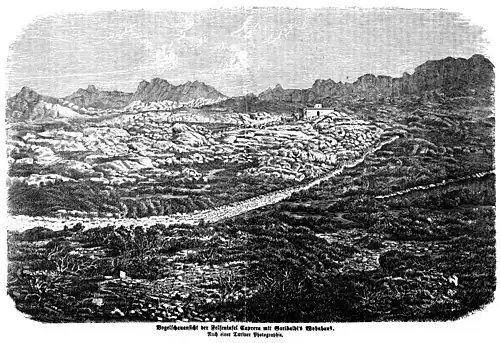 Die Gartenlaube (1861) b 157.jpg Vogelschauansicht der Felseninsel Caprera mit Garibaldi’s Wohnhaus. Nach einer Turiner Photographie (S)