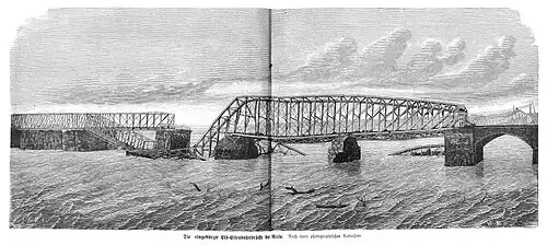 Die Gartenlaube (1876) b 206.jpg Die eingestürzte Elb-Eisenbahnbrücke bei Riesa