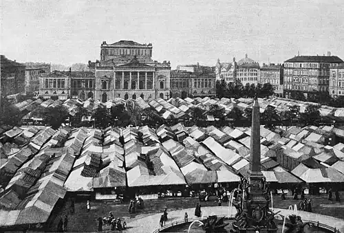 Die Gartenlaube (1897) b 429.jpg Der heutige Meßverkehr auf dem Augustusplatz in Leipzig