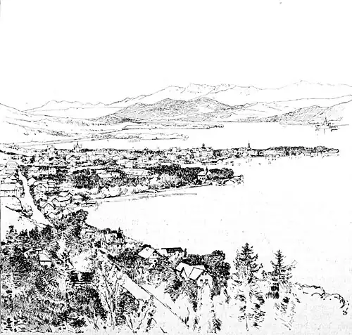 Die Gartenlaube (1897) b 4.jpg Östliche Hälfte des Sees mit Pörtschach; im Hintergrunde rechts die kleine Halbinsel Maria Wörth