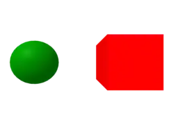 Grüne Kugel und roter Würfel