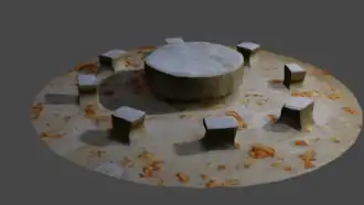 Steinerne Sitzgruppe mit Herbstlaub