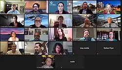 Picture 1 - People attending video conferencing meeting