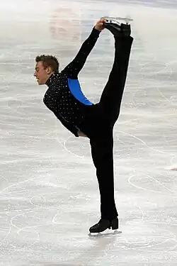 A standing split in figure skating.